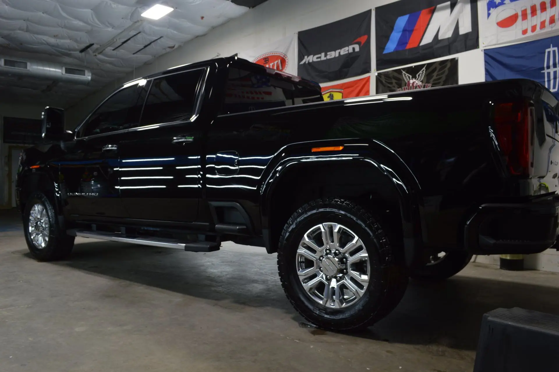 black pickup truck behind full paint correction wash doc auto detailing haltom tx